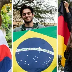 Suyeon, Paulo y Eleftheria con la bandera de su país