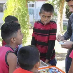 alumnos y niños en la Casa del Migrante