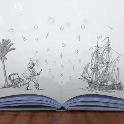 Libro abierto con dibujos que cuentan una historia.